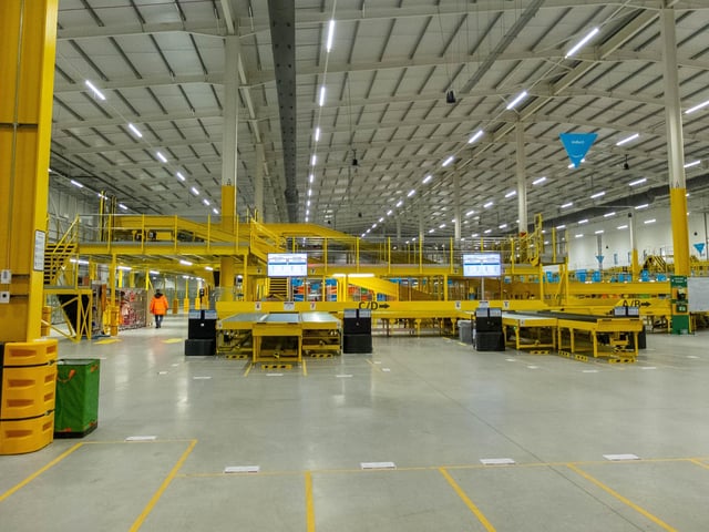Inside the warehouse, which has just started running