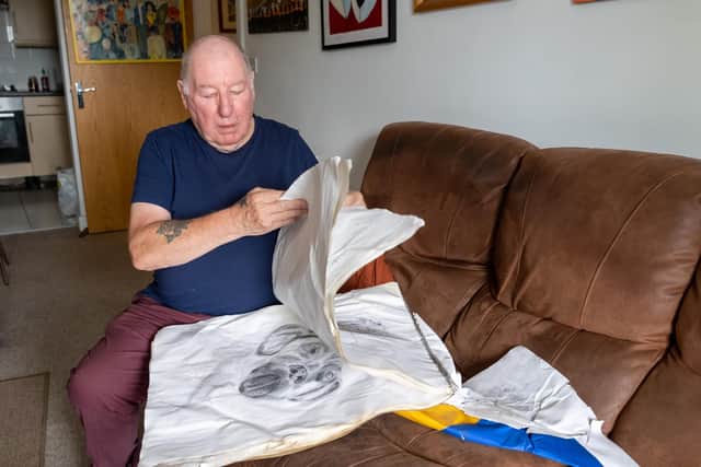Adrian Weston, looking through an old sketch book. Picture: Andy Hornby