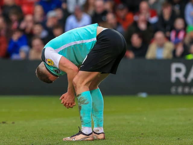 A dejected Colby Bishop agonises over his late miss at Lincoln. Picture: Jez Tighe/ProSportsImages