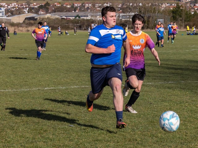 Bulldog (blue) vs King George Rovers. Picture: Mike Cooter