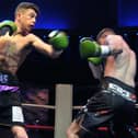 Lucas Ballingall, left, fights for the English lightweight title in Sheffield on Friday. Picture: Mick Young