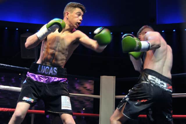 Lucas Ballingall, left, fights for the English lightweight title in Sheffield on Friday. Picture: Mick Young
