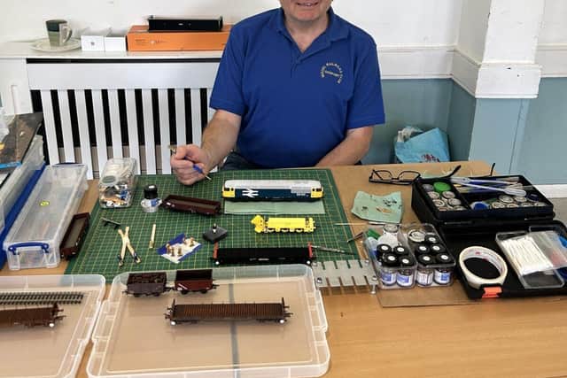 John Gowan weathering his models.