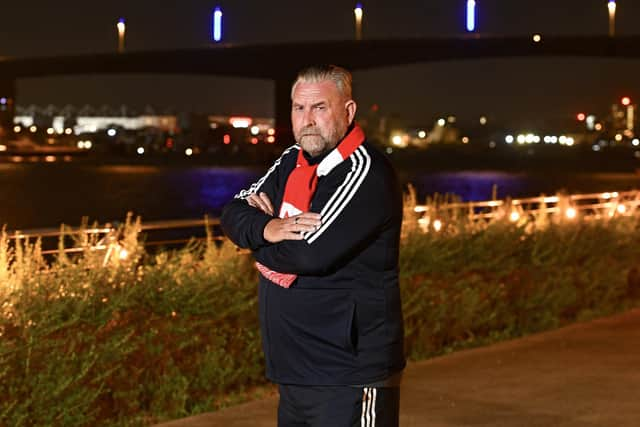 Pictured: Perry McMillian by Itchen Bridge, Southampton, where the bridge is lit by blue lighting. 
© Ollie Thompson/Solent News & Photo Agency