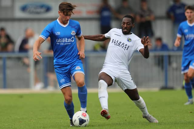 Roarie Deacon, right, in action against Eastleigh’s Cavaghn Miley during last year's pre-season friendly at Westleigh Park. The clubs will meet again in September at the Silverlake Stadium. Photo by Dave Haines/Portsmouth News