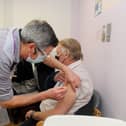 The Portsmouth NHS Covid-19 Vaccination Centre at Hamble House based at St James Hospital opened on Monday, February 1, 2021.

Pictured is: David Senior (75) from Cosham, having his vaccination.

Picture: Sarah Standing (010221-1959)
