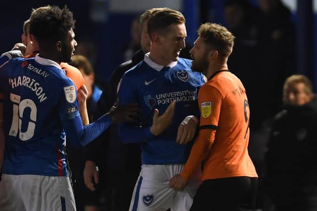 Oxford's Matty Taylor pictured grabbing Ronan Curtis by the genitals. Picture: Mike Hewitt/Getty Images
