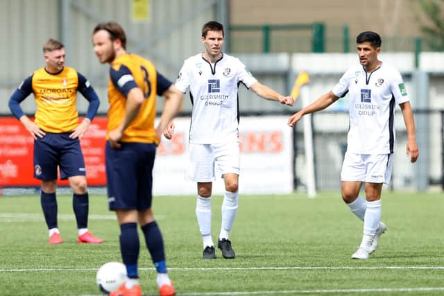 Charlie Sheringham (middle) is congratulated by Noor Husin after scoring his second goal at Slough last Sunday. Photo by Warren Little/Getty Images.
