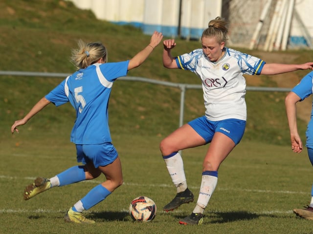 Hawks' Jodie Burchel, right. Picture by Dave Haines