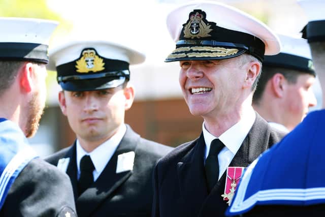 Rear Admiral Jim Higham OBE inspects the Guard of Honour at HMS Sultan.