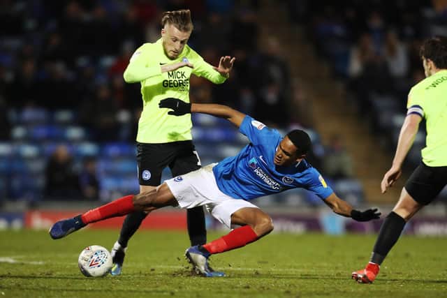 Haji Mnoga makes a tackle against Peterborough last season. Picture: Joe Pepler