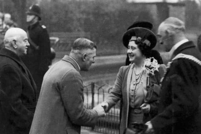 The Queen meets civic dignitaries during a visit to Portsmouth on September 30, 1942.