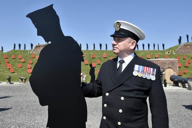 Standing With Giants an outdoor art installation with life-size silhouettes of the 258 military personnel and civilians who lost their lives in the Falklands conflict. Veteran Mark Edwards Picture: Sarah Standing (200423-2230)