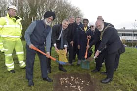 1000 spring bulbs were planted on Monday, November 28, at Nanak Woods next to Western Road, Portsmouth.

Pictured is: (l-r) Tom Elliott from Colas, Dalbara Kalsi, Nigel Atkinson ESQ HM Lord-Lieutenant of Hampshire, The Very Reverend Dr Anthony Cane, Cllr. Lee Mason, Lady mayoress of Portsmouth Marie Costa, Chitranjan Chadha, Charles Haskell and the Lord mayor of Portsmouth Hugh Mason.

Picture: Sarah Standing (281122-7112)
