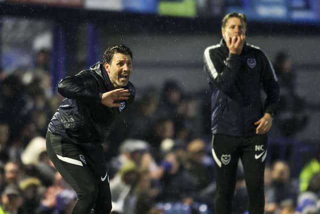 Danny and Nicky Cowley on the Fratton Park touchline during Tuesday night's win against Oxford