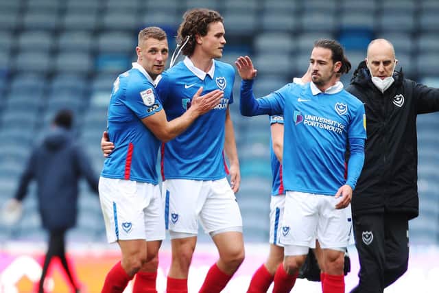From left: Lee Brown, Rasmus Nicolaisen and Ryan Williams look relieved at the final whistle. Picture: Joe Pepler