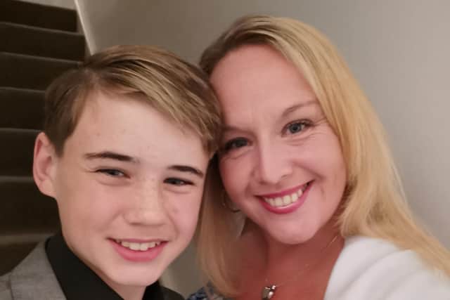 Sam Grant, 14, with his mother, Helen Grant.