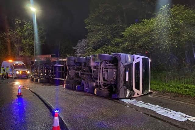 Firefighters rescued the driver of this lorry early yesterday morning. Picture: HIWFRS.