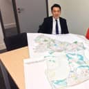 Alan Mak MP with a previous version of Havant Borough Council's Local Plan
