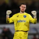 New Morecambe recruit Trevor Carson played 39 times for Pompey during the 2013-14 season.