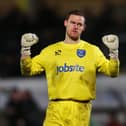 New Morecambe recruit Trevor Carson played 39 times for Pompey during the 2013-14 season.