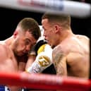 Lucas Ballingall (left) in action against Myron Mills during their English Lightweight title bout in Sheffield. Picture: Zac Goodwin/PA Wire.