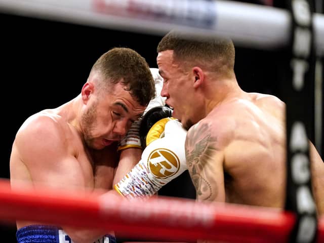 Lucas Ballingall (left) in action against Myron Mills during their English Lightweight title bout in Sheffield. Picture: Zac Goodwin/PA Wire.