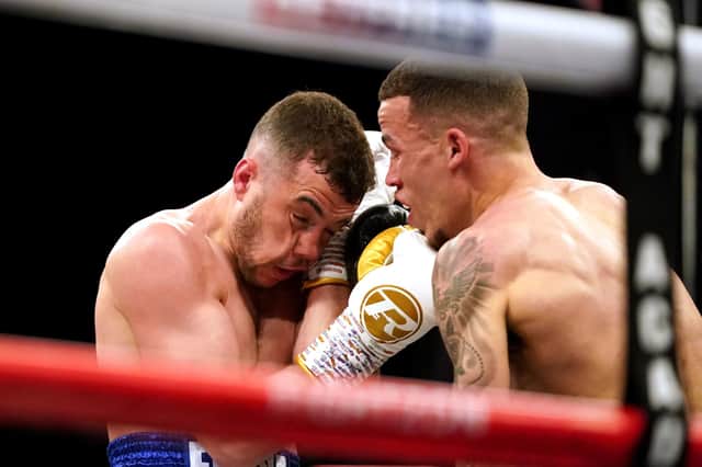 Lucas Ballingall (left) in action against Myron Mills during their English Lightweight title bout in Sheffield. Picture: Zac Goodwin/PA Wire.