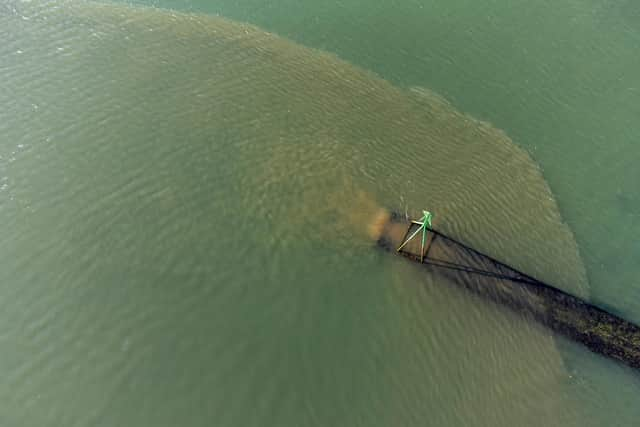 Southern Water's Budds Farm outfall photographed pouring out untreated sewage at 3.42pm on October 21 2021. Picture: Chris Pearsall Commercial Photography