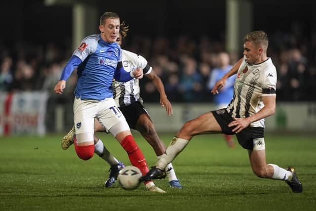 Pompey forward Ronan Curtis picked up the injury during this challenge from Hereford defender Jack Evans.