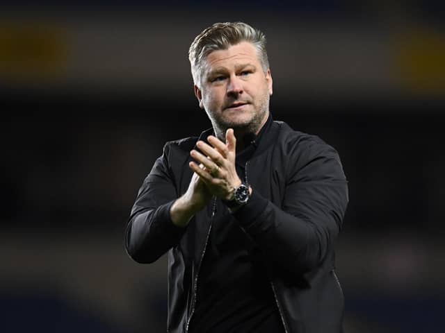 Oxford United boss Karl Robinson has been installed as the bookies' favourite to land the QPR role.