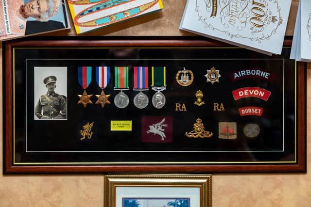 Jack's medals and regimental insignia. Picture: Mike Cooter (030222)