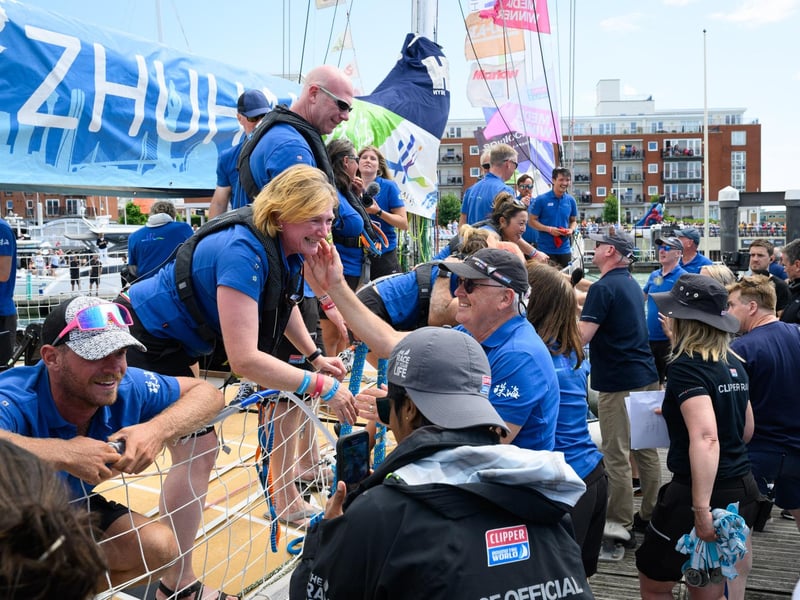 Crew members hug and greet family and friends.Picture: Keith Woodland (270721-48)