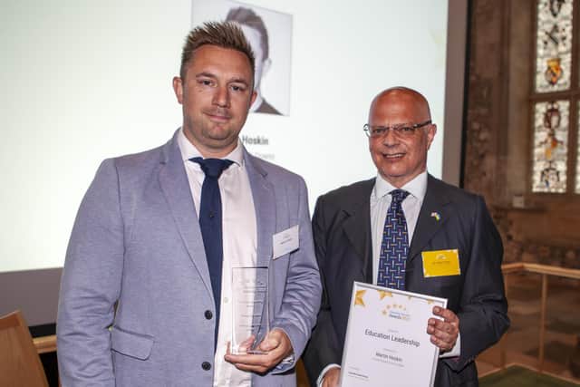 Martin Hoskin collects his Education Leadership Award