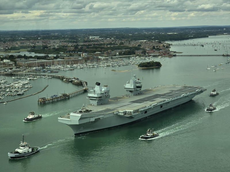 Drone picture of aircraft carrier HMS Prince of Wales leaving Portsmouth on routine tasking.