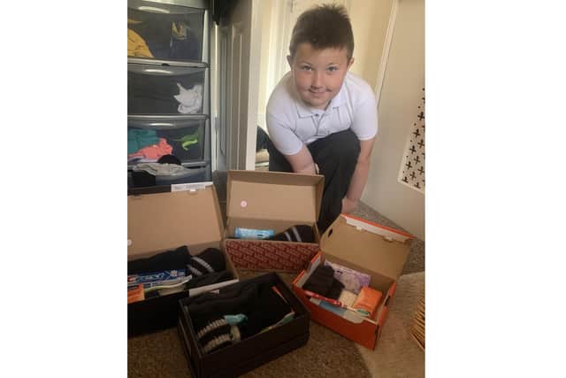 Albie Leahy, 8 from Waterlooville, has created shoeboxes for the homeless people of Portsmouth to enjoy this Christmas
