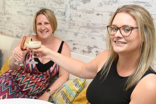 Pictured is: Natalie Harrison and Jade Scotty enjoy a cocktail
Picture: Keith Woodland (310721-10)