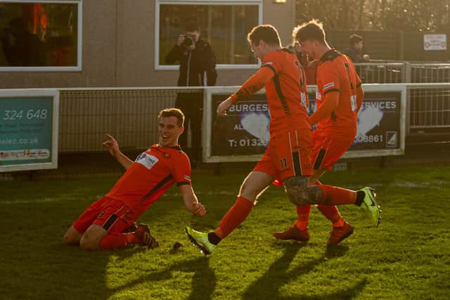 Jason Parish celebrates scoring for Portchester against his former club Baffins. Picture: Vernon Nash