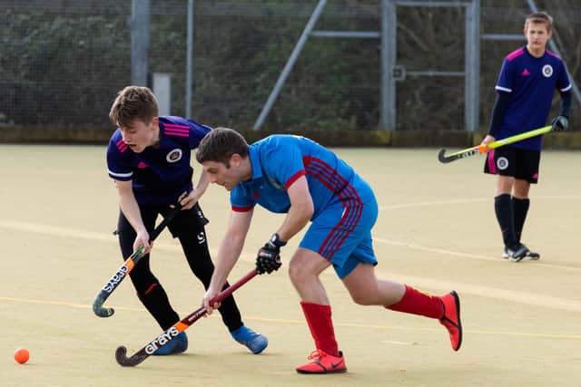 Portsmouth 4ths' Ryan Rochester (purple) in action during his side's 2-0 win over US Portsmouth 2nds. Picture: Duncan Shepherd