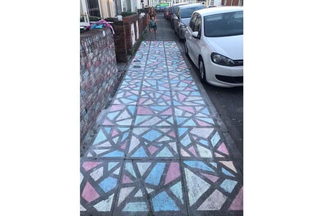 Chloe and Callum Topham, 10 and 5, have brightened up Portchester Road in North End with their colourful chalk design