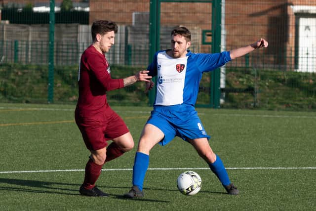 Rowner Rovers (blue/white) in action against FC Strawberry during their debut 2019/20 Mid-Solent League season. Picture: Duncan Shepherd