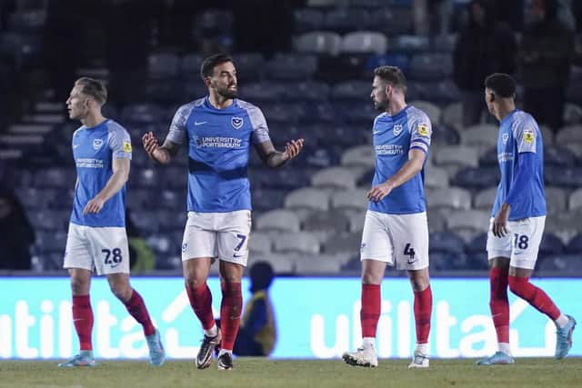 Marlon Pack tries to rally the Pompey players during today's 2-0 defeat against MK Dons