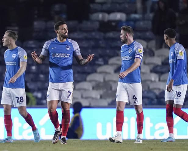 Marlon Pack tries to rally the Pompey players during today's 2-0 defeat against MK Dons