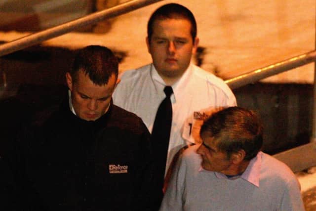 Peter Tobin, is taken from Dundee High Court on December 2, 2008 in Dundee, Scotland. Peter Tobin has been found guilty on December 2, 2008 of the murder of Falkirk schoolgirl Vicky Hamilton, who disappeared more than 17 years ago. He has been sentenced to a minimum of 30 years in jail. Picture: Jeff J Mitchell/Getty Images.