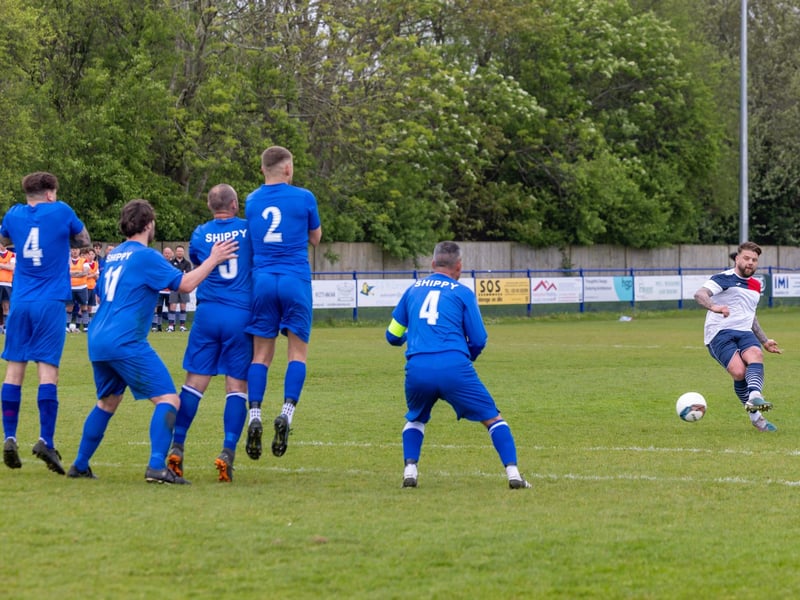 Team Sherie have an attempt on goal from a free-kick.