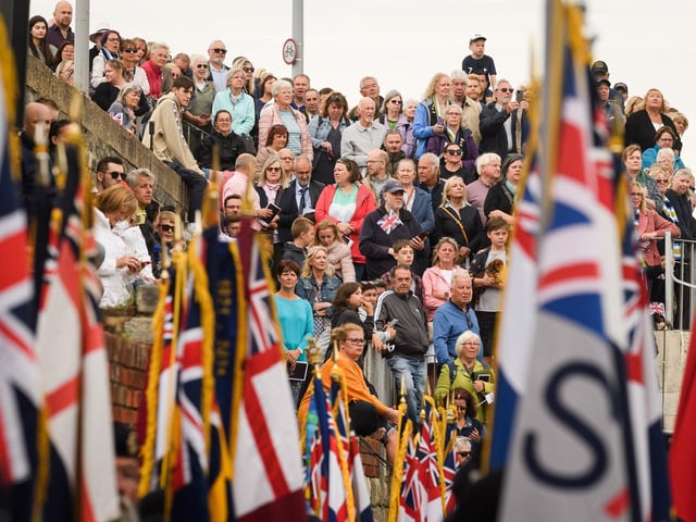 Pictured is: Crowds gather to witness the parade. Picture: Keith Woodland (190621-130)