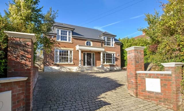 The listing says: "This symmetrical fronted family home is quite unique for the area, being a modern property within an established 1930s residential location."