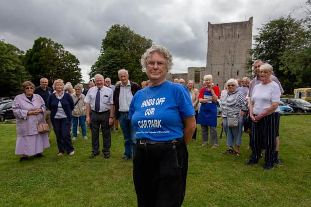 Chair of Portchester Society, Jean Withinshaw with members of Portchester Sailing Club and volunteers at the church cafe in front of the Portchester Castle car park in August last year Picture: Habibur Rahman