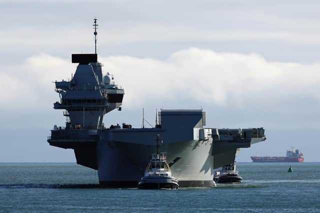 Aircraft Carrier HMS Queen Elizabeth heading towards her homeport of Portsmouth. Picture: Will Haigh