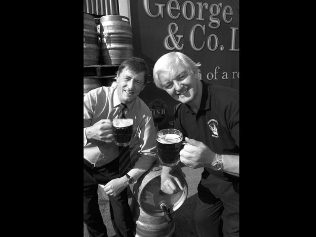 Gales Brewery, Horndean, head brewer Derek Lowe (left) with Colin Colesell, chairman of Portsmouth CAMRA, getting a pre-taste before the forthcoming Portsmouth Beerex at the Guildhall back in 2000. Picture: Michael Scaddan 004521-0044